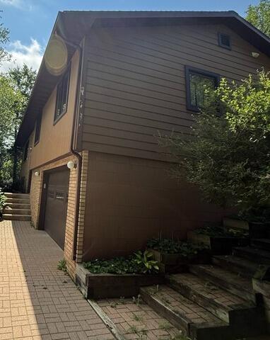 Gutter Shutter System in Spicer - Before Photo