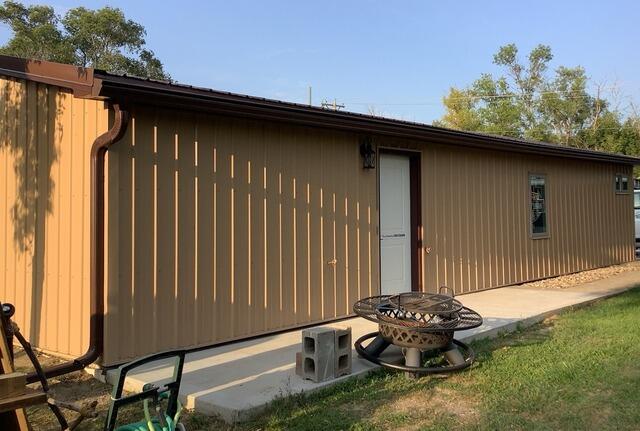 Shed getting Debris sheeding Gutter System in Wolsey SD - After Photo