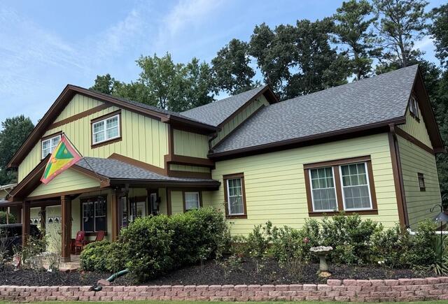 Gutter Shutter Contractor Installed Gutter System in Dunwoody, GA | Seamless Gutters in Musket Brown - After Photo