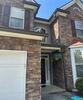 Lawrenceville, GA Gutter Shutter Installation in Musket Brown