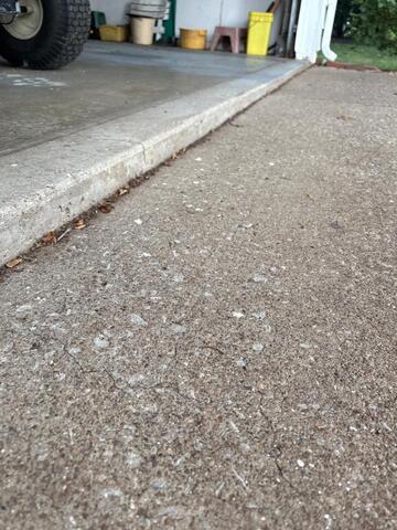 Leveling a driveway in Huron, OH. - Before Photo