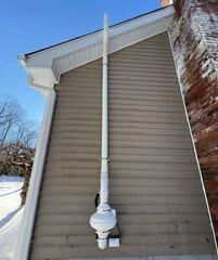 Two-Pipe Radon Mitigation System Installed in New Fairfield Colonial Home ( Exterior)