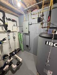 Two-Pipe Radon Mitigation System Installed in Branford Home Mechanical Room