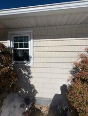 Exterior Radon Mitigation System Installed for Slab Home in Woodbury