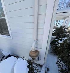 Radon System Service Inspection for Exterior Pipe Crack in Fairfield