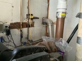 One-Point Radon Mitigation System Planned for Cornwall Bridge Home Interior