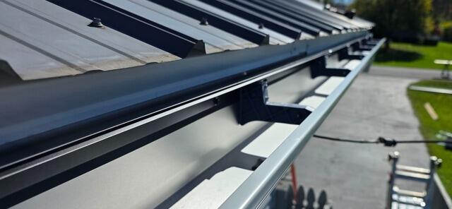 Gutter Cover Insulation in Oswego, NY - Before Photo