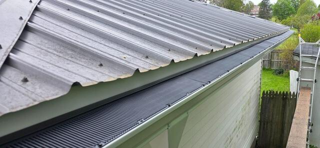 Gutter Cover Insulation in Oswego, NY - After Photo