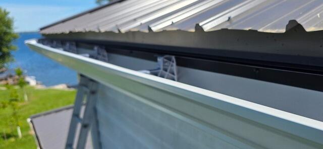 Seamless Gutter Installation in Chaumont, NY - Before Photo