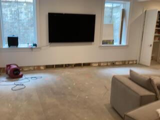 Basement Appliance Leak Soaks Floors in Riverside, CT.
