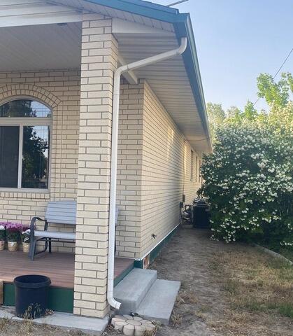 New Gutter System Protects Porch and Foundation in American Fork - Before Photo
