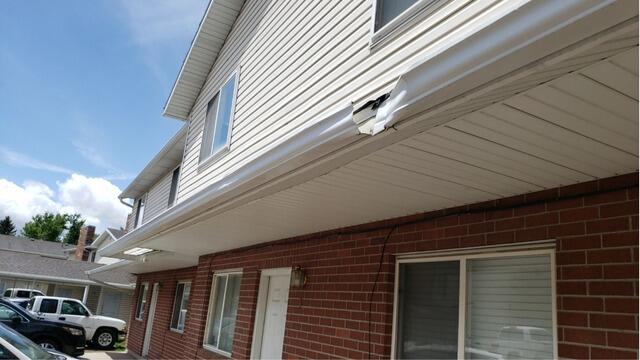Restored Gutters and Soffit Protection in Logan - Before Photo