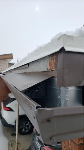 Heavy-Duty Gutter Shutter Protects Orem Home from Snow Damage