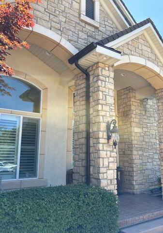 Seamless Brown Gutters Elevate Draper Home's Entryway - After Photo