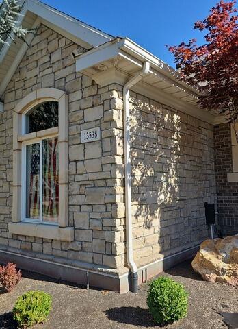 Brown Gutters Add Rich Contrast to a Draper Home - Before Photo