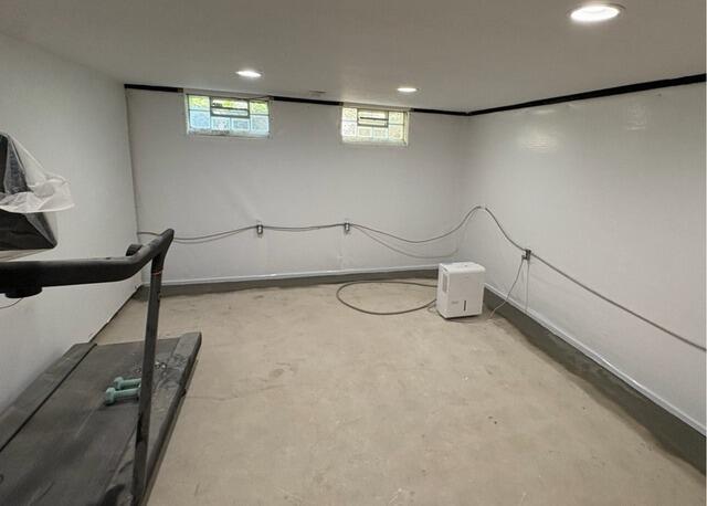 Waterproofed Basement with Elite Plank Flooring in Rocky River, OH
