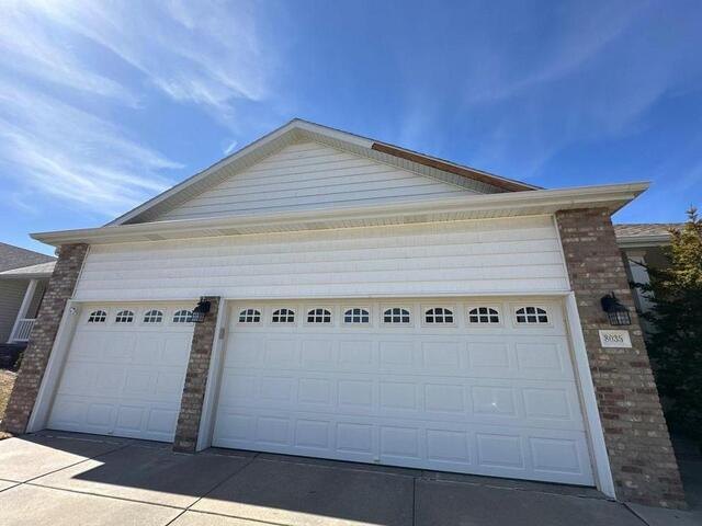 Metal Fascia Maintenance in Lincoln, NE for Aaron H. - Before Photo