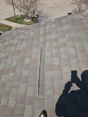 Shingle Roof Maintenance in Lincoln, NE for Larry C. - Before Photo