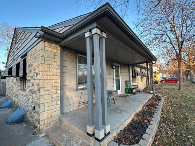 Full Exterior Siding Installation in Lincoln, NE for Josh R. - Before Photo