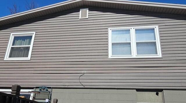 Vinyl Siding Repair for Mark D. in La Vista, NE - Before Photo