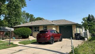 Full Exterior Roofing Installation in Lincoln, NE for Chris & Annet G.