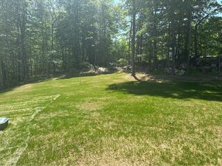 Eye-catching Cypress Woodgrain Vinyl Fence in Portland, CT
