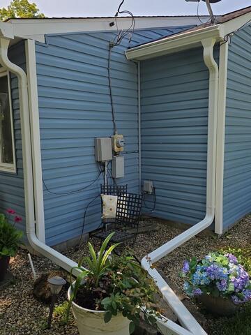 Replacing a Failed Gutter Protection System with Gutter Shutter Installation in Bryan, Ohio - After Photo