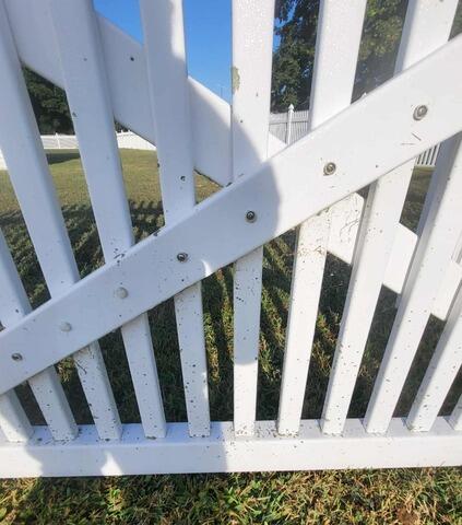 Vinyl Fence Cleaning in Milford, DE - Before Photo