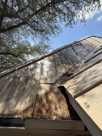 Dirty Algae Covered Metal Roof Cleaning in Leander, TX - 