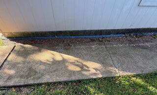 Algae and Moss Removal Off Foundation/Sidewalk in Austin, TX
