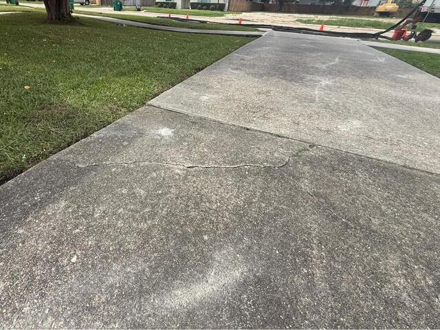 Lifting and Leveling a Sinking Driveway in Metairie, LA! - After Photo
