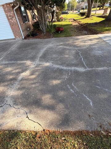 Crack Sealing on a Driveway in Luling, LA! - Before Photo
