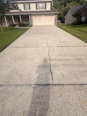 Driveway Lifting in Mandeville, LA! - Before Photo
