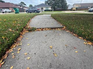 Lifting a Sinking Walkway in Metairie, LA!