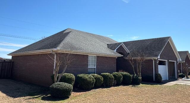 Roof Replacement Due to Wind Damage in Muscle Shoals, Al - Before Photo