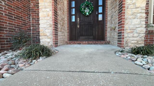 Lifting and Stabilizing concrete porch in Rogers, AR