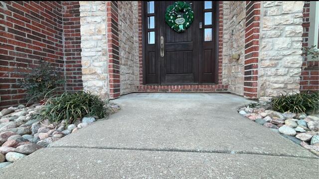 Lifting and Stabilizing concrete porch in Rogers, AR