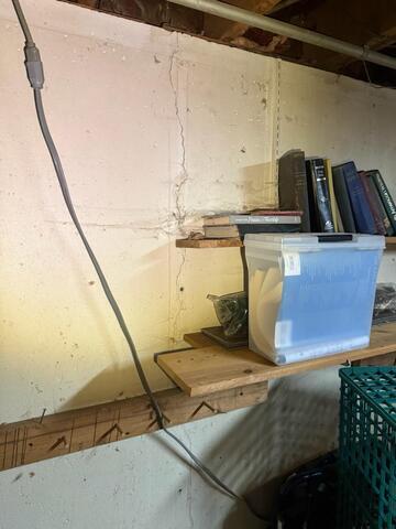 Leaky Basement Wall Crack Repaired in Peotone, IL - Before Photo
