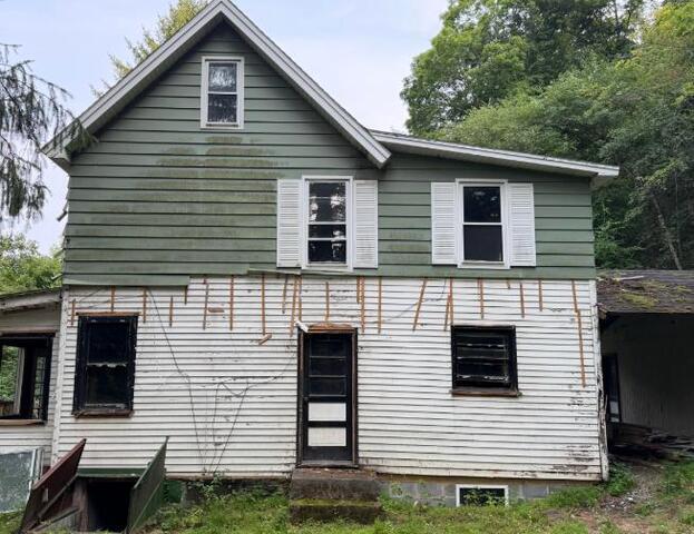 Cleared for Action: Essential Asbestos Inspection Services in Williamsport PA 17701 - Before Photo