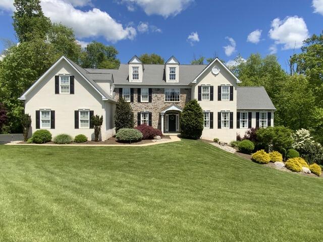 Ambler Home Transformation: New Siding, Windows & Stucco Remediation - 