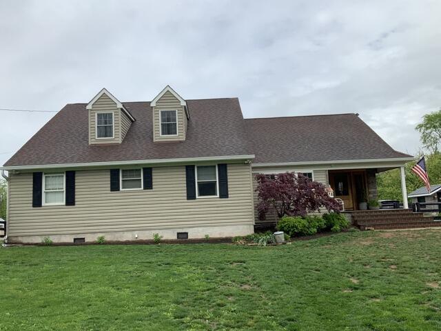 A Bold New Look: Black Metal Roofing & White Hardie Siding in Phoenixville - 