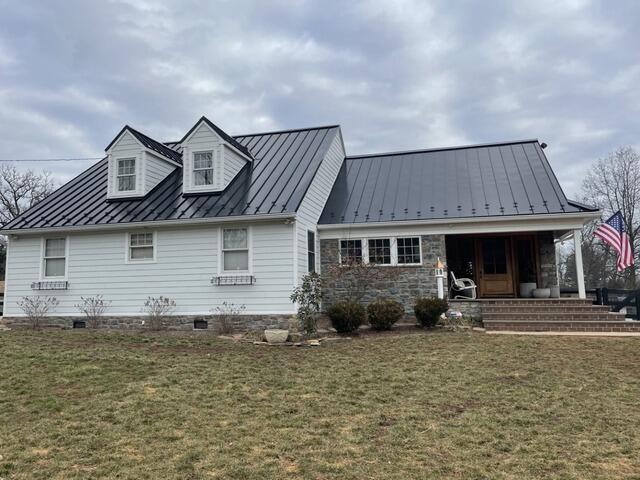 A Bold New Look: Black Metal Roofing & White Hardie Siding in Phoenixville