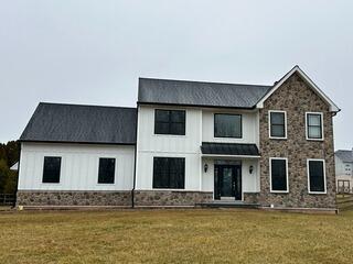 Elegant Exterior Renovation in Royerford, PA | James Hardie® Arctic White & Energy-Efficient Windows