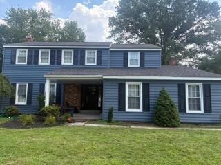 A Coastal-Inspired Exterior Refresh with Harbor Blue Siding