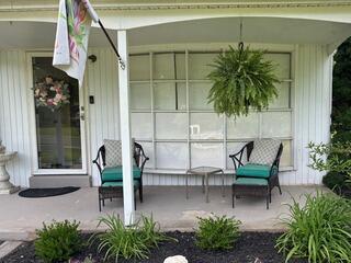 From an Oversized Bow Window to a Seamless Exterior Transformation