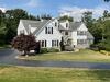 Ambler Home Transformation: New Siding, Windows & Stucco Remediation