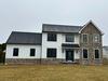 Elegant Exterior Renovation in Royerford, PA | James Hardie® Arctic White & Energy-Efficient Windows