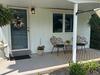 From an Oversized Bow Window to a Seamless Exterior Transformation