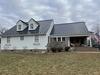 Black Metal Roofing & White Hardie Siding in Phoenixville, PA
