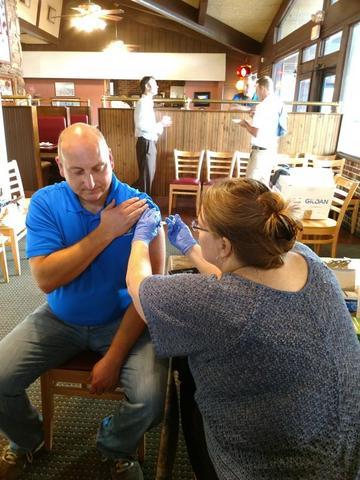Company Provides Free Flu Shots - Image 1